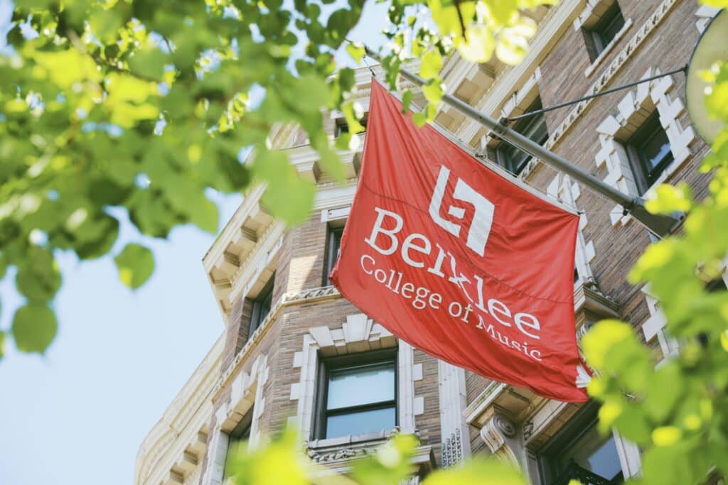 A red flag with the Berklee College of Music logo