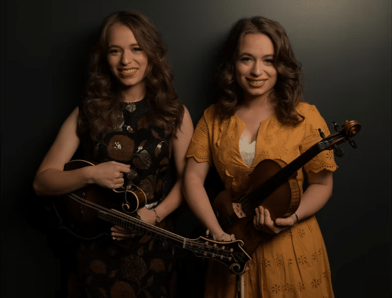 Price Sisters photo holding mandolin and fiddle.